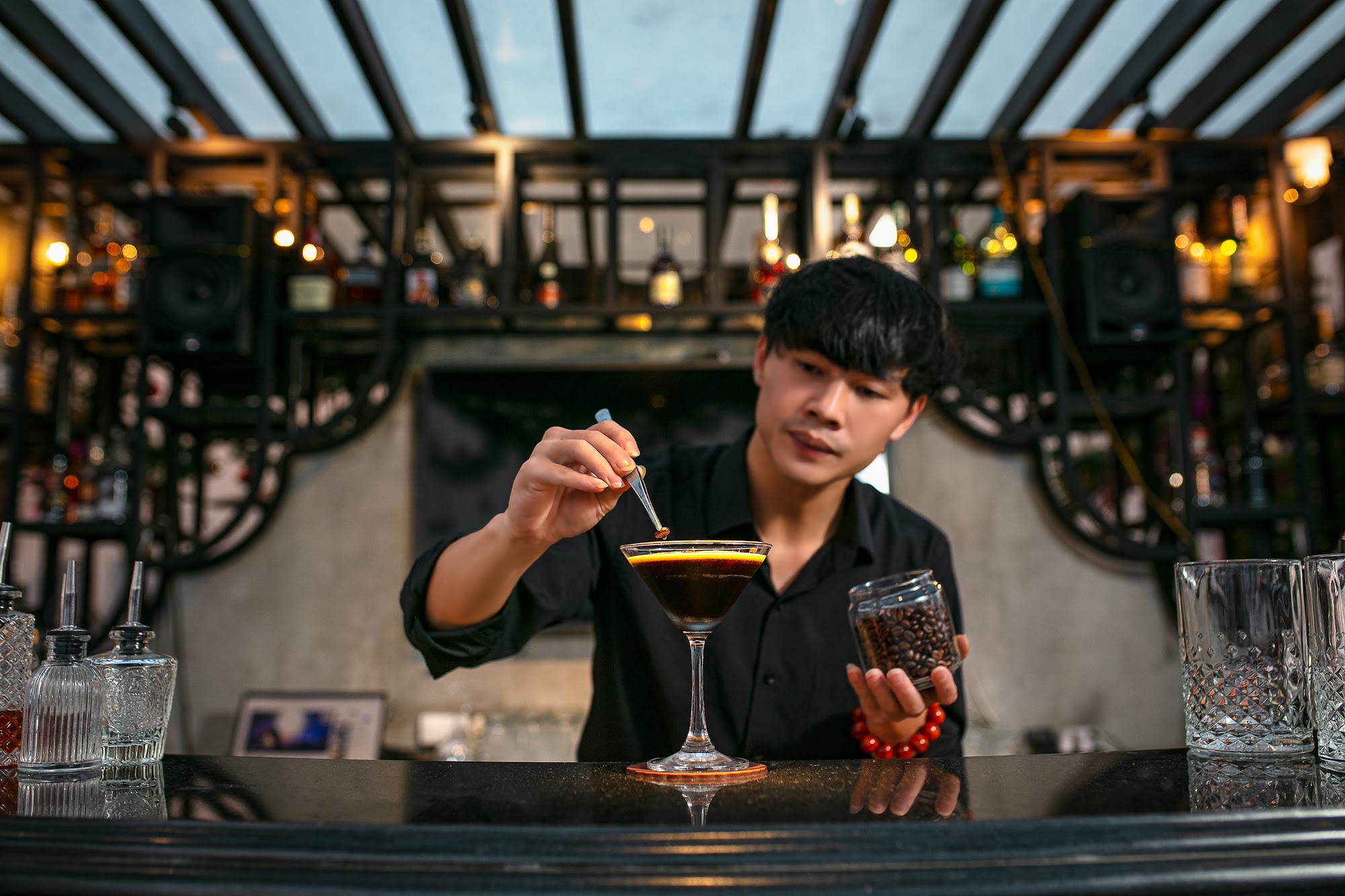 Bartender at rooftop bar - san hotel series hanoi vietnam